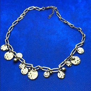 Gold and grey fake pearl necklace.